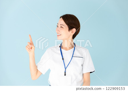 Female, white coat, nurse, medical, pointing 122909153