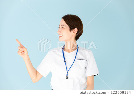Female, white coat, nurse, medical, pointing 122909154