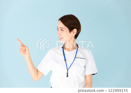 Female, white coat, nurse, medical, pointing 122909155