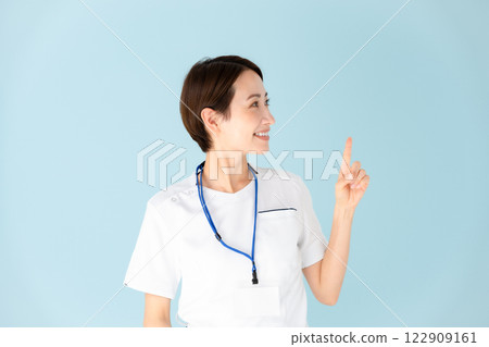 Female, white coat, nurse, medical, pointing 122909161