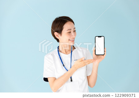 Woman, white coat, nurse, medical, smartphone Woman, white coat, nurse, medical, smartphone 122909371