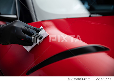 Ceramic or graphene coating on red paint ensures vibrant color deep gloss Ceramic or graphene coating on red paint ensures vibrant color deep gloss 122909667