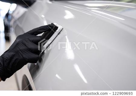 Ceramic or graphene coating on white paint 122909693