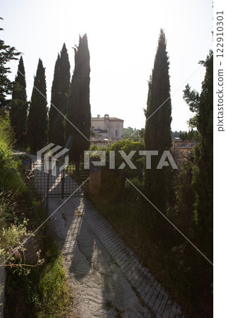 The winding narrow streets, stairs and charming architecture of Spoleto 122910301