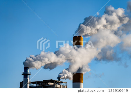Smoke rising from the factory chimneys 122910649