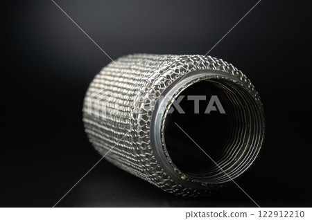 Close-up Selective focus picture with noise effect of exhaust pipe flexible connector 122912210
