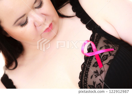 Big woman in bra with pink cancer ribbon Big woman in bra with pink cancer ribbon 122912987
