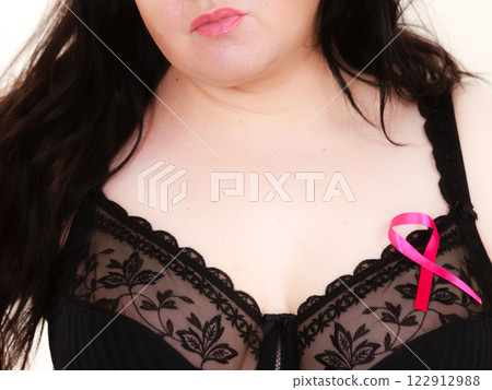 Big woman in bra with pink cancer ribbon Big woman in bra with pink cancer ribbon 122912988