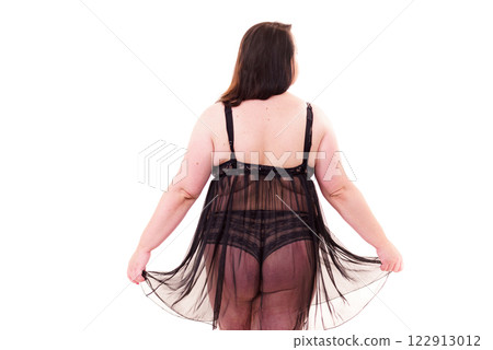 Fat woman in lingerie back view. Fat woman in lingerie back view. 122913012