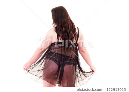 Fat woman in lingerie back view. Fat woman in lingerie back view. 122913013