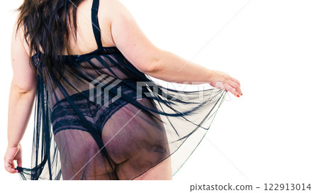 Plus size woman in lingerie tunic Plus size woman in lingerie tunic 122913014