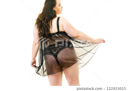 Plus size woman in lingerie tunic Plus size woman in lingerie tunic 122913015