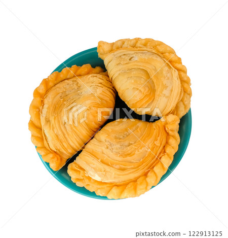 Fried curry puff or karipap in Thai on dishwasher .This pastry is asian traditional. 122913125