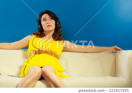 girl in headphones listening music mp3 relaxing girl in headphones listening music mp3 relaxing 122913505