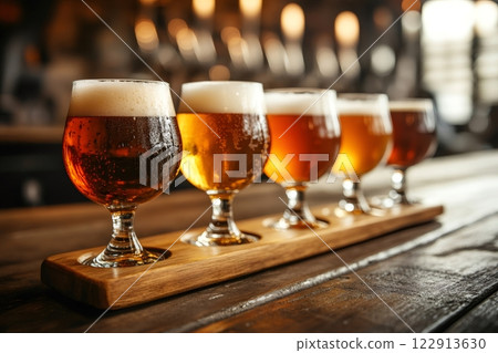 Bartender serving beer flight in brewery pub 122913630