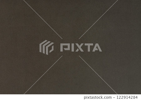 Dark textured surface with subtle color variations makes intriguing backdrop 122914284