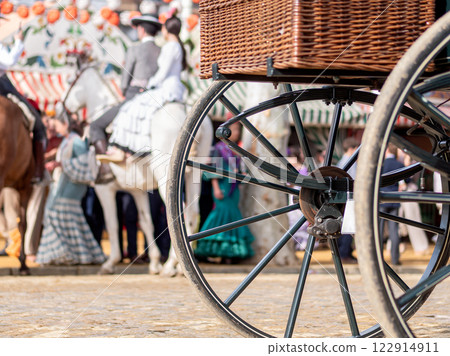 Traditional fair scene with carriage wheel 122914911