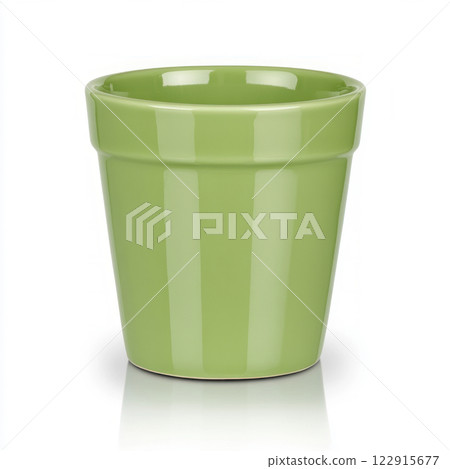 A glossy green flower pot perfect for indoor gardening. isolated on white background. 122915677