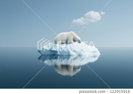A solitary polar bear rests on a small iceberg, reflecting gracefully in calm waters under a clear blue sky. 122915918