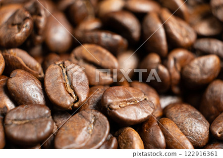 Organic coffee beans detailed texture close up Organic coffee beans detailed texture close up 122916361