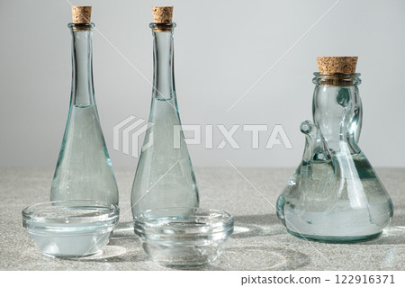White distilled table vinegar in a glass bowls White distilled table vinegar in a glass bowls 122916371