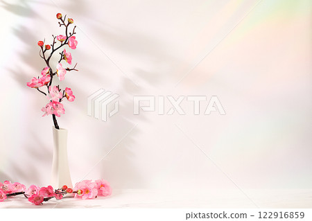 Abstract spring flower arrangement with cherry blossom branches in vase,elegant beauty concept,stage for product display and business concept.Minimal modern aesthetics Abstract spring flower arrangement with cherry blossom branches in vase,elegant beauty concept,stage for product display and business concept.Minimal modern aesthetics 122916859