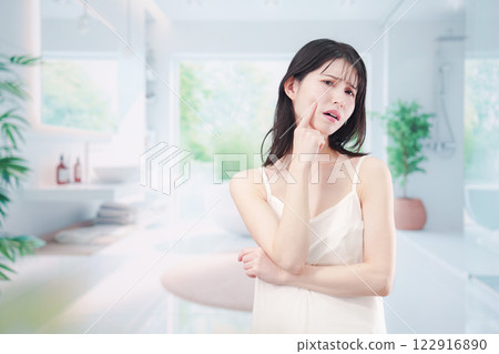 Young woman suffering from skin problems Young woman suffering from skin problems 122916890