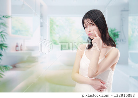 Young woman suffering from skin problems 122916898