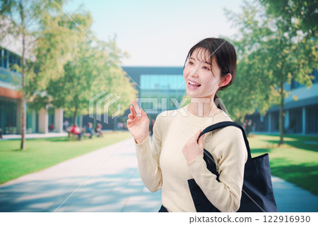 Young woman on college campus 122916930