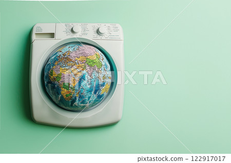 the globe in the window of the washing machine, the concept of ecological washing products 122917017