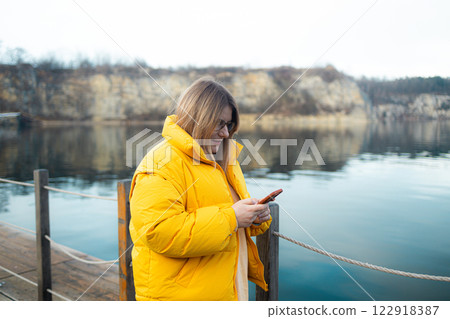 Young caucasian woman sending message using smartphone annoyed and frustrated shouting with anger, crazy and yelling with raised hand, anger concept Young caucasian woman sending message using smartphone annoyed and frustrated shouting with anger, crazy and yelling with raised hand, anger concept 122918387