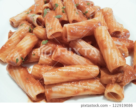 short pasta with bolognese sauce and parsley short pasta with bolognese sauce and parsley 122919086
