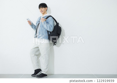 A man operating a smartphone 122919939