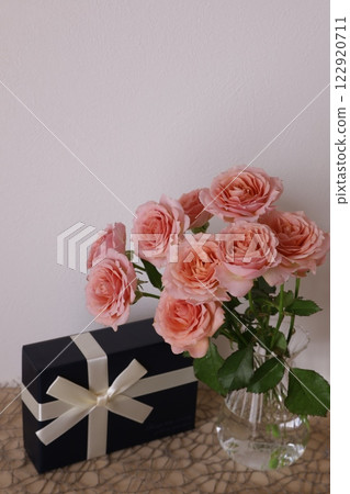Pink roses and gifts 122920711