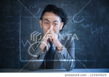 Image of a bearded businessman in a suit and advertising or marketing, looking at the camera Image of a bearded businessman in a suit and advertising or marketing, looking at the camera 122920829
