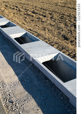 Waterway Concrete pipe laid on the side of the road a-1 Waterway Concrete pipe laid on the side of the road a-1 122921010