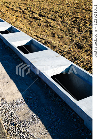 Waterway Concrete pipe laid along the road a-2 High saturation contrast Waterway Concrete pipe laid along the road a-2 High saturation contrast 122921011