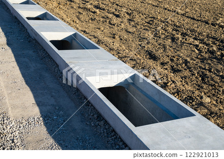 Waterway Concrete pipe laid on the side of the road b-1 122921013