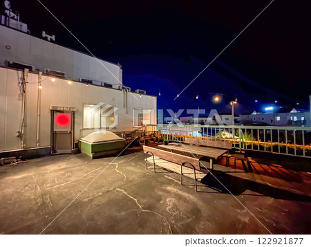 A night view of the smoking area on the rooftop 122921877