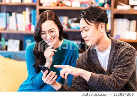 Young couple talking over coffee 122924209