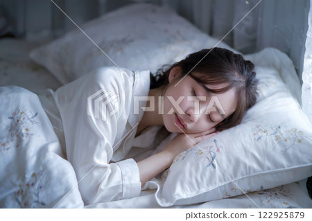 Young woman sleeping in bed Generative AI 122925879