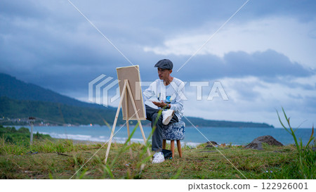 Young Artist Painting Ocean View Landscape on Canvas Outdoors Hobby Art, 122926001