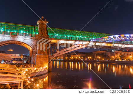 Pushkinskiy bridge with night illumination. Bridge to Gorky Park. 122926338