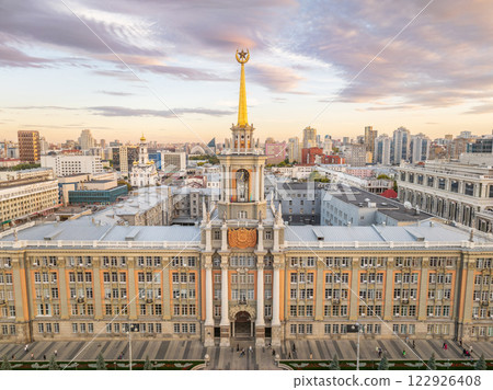 Yekaterinburg City Administration or City Hall and Central square at summer evening. Evening city in the summer sunset, Aerial View. Yekaterinburg City Administration or City Hall and Central square at summer evening. Evening city in the summer sunset, Aerial View. 122926408