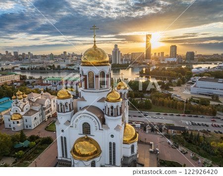 Autumn Yekaterinburg and Temple on Blood in beautiful clear sunset. Aerial view of Yekaterinburg, Russia. Translation of the text on the temple: Honest to the Lord is the death of His saints. Autumn Yekaterinburg and Temple on Blood in beautiful clear sunset. Aerial view of Yekaterinburg, Russia. Translation of the text on the temple: Honest to the Lord is the death of His saints. 122926420