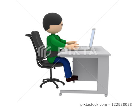 A businessman at a desk operating a laptop A businessman at a desk operating a laptop 122928058