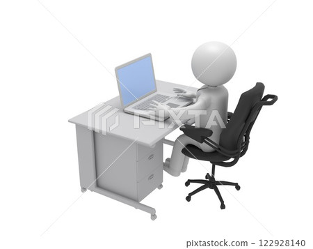 A businessman at a desk operating a laptop A businessman at a desk operating a laptop 122928140