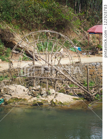 Ancient waterwheel in the ancient village of Bamei, Yunnan Ancient waterwheel in the ancient village of Bamei, Yunnan 122928783
