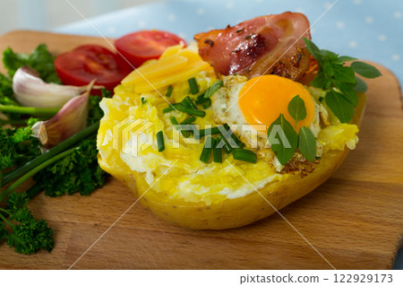 Delicious baked farci potato with cheese 122929173