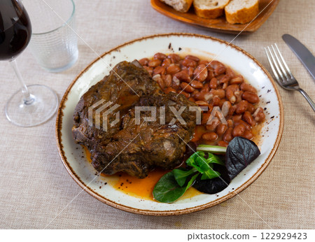 Tasty soft pork with stewed beans. Healthy food Tasty soft pork with stewed beans. Healthy food 122929423